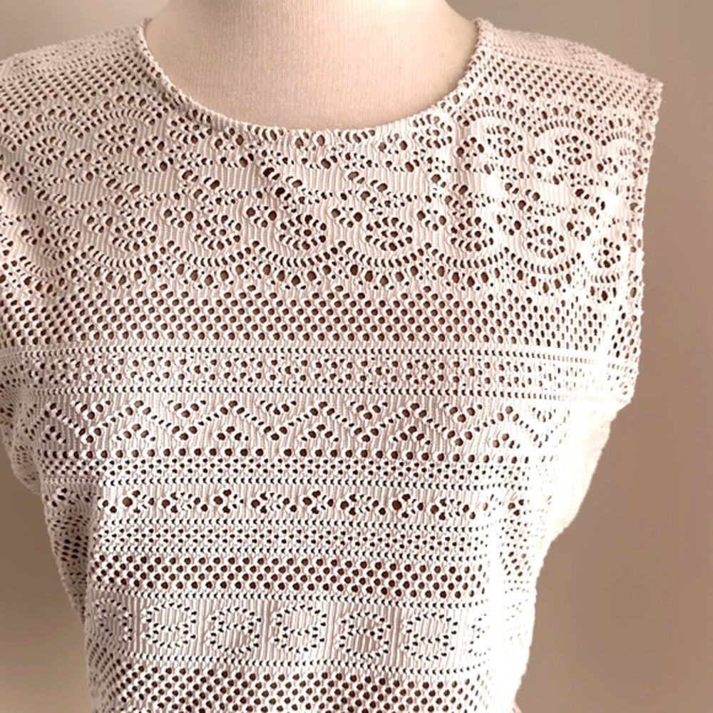 BCBGMaxAzria peplum sleeveless top in ivory lace